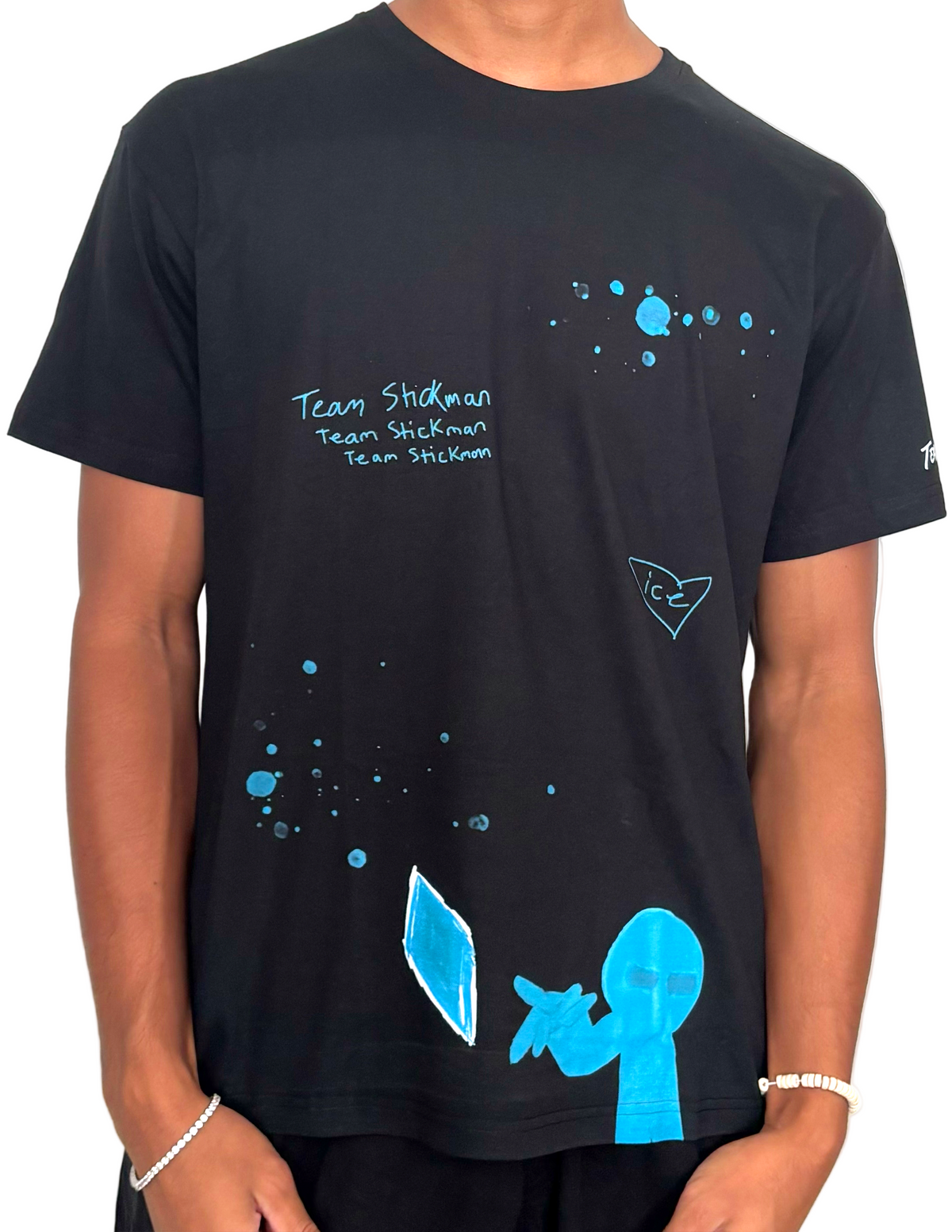 Black t-shirt with blue graphics and text on a white background
